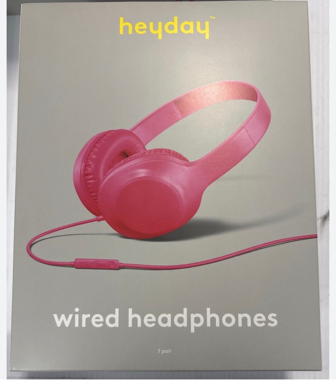 These are pink Heyday wired on-ear headphones with a built-in microphone.