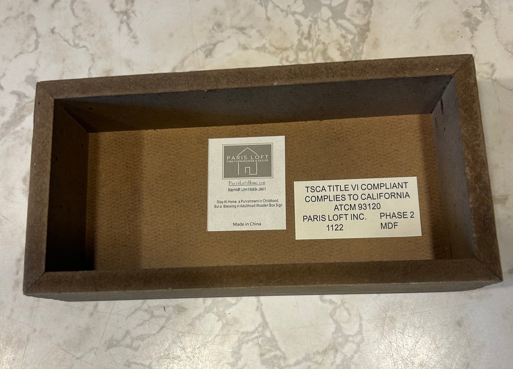 This is a natural wood keepsake box featuring a personalized engraved quote, “stay at home. A punishment in childhood but a blessing in adulthood.