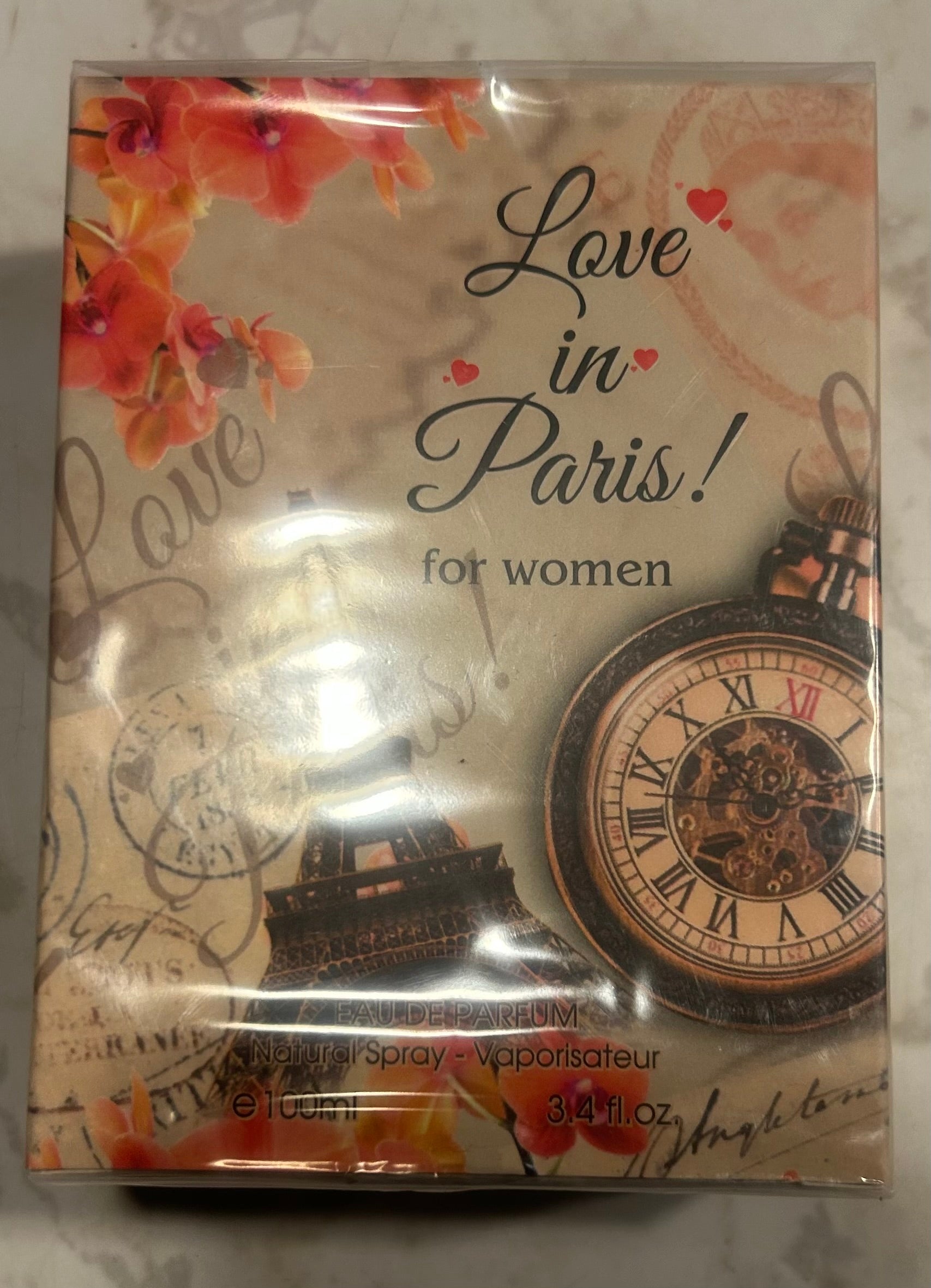 a 3.4 fl oz (100ml) bottle of "Love in Paris" eau de parfum for women.