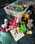 a variety of classic 1990s Beanie Babies, including a tie-dye rabbit (Hippity, Hoppity, or Floppity), Rover the red dog, Strut the rooster, a pink flamingo (Pinky), and a penguin (Rover/Squealer era style. 3 for 25$