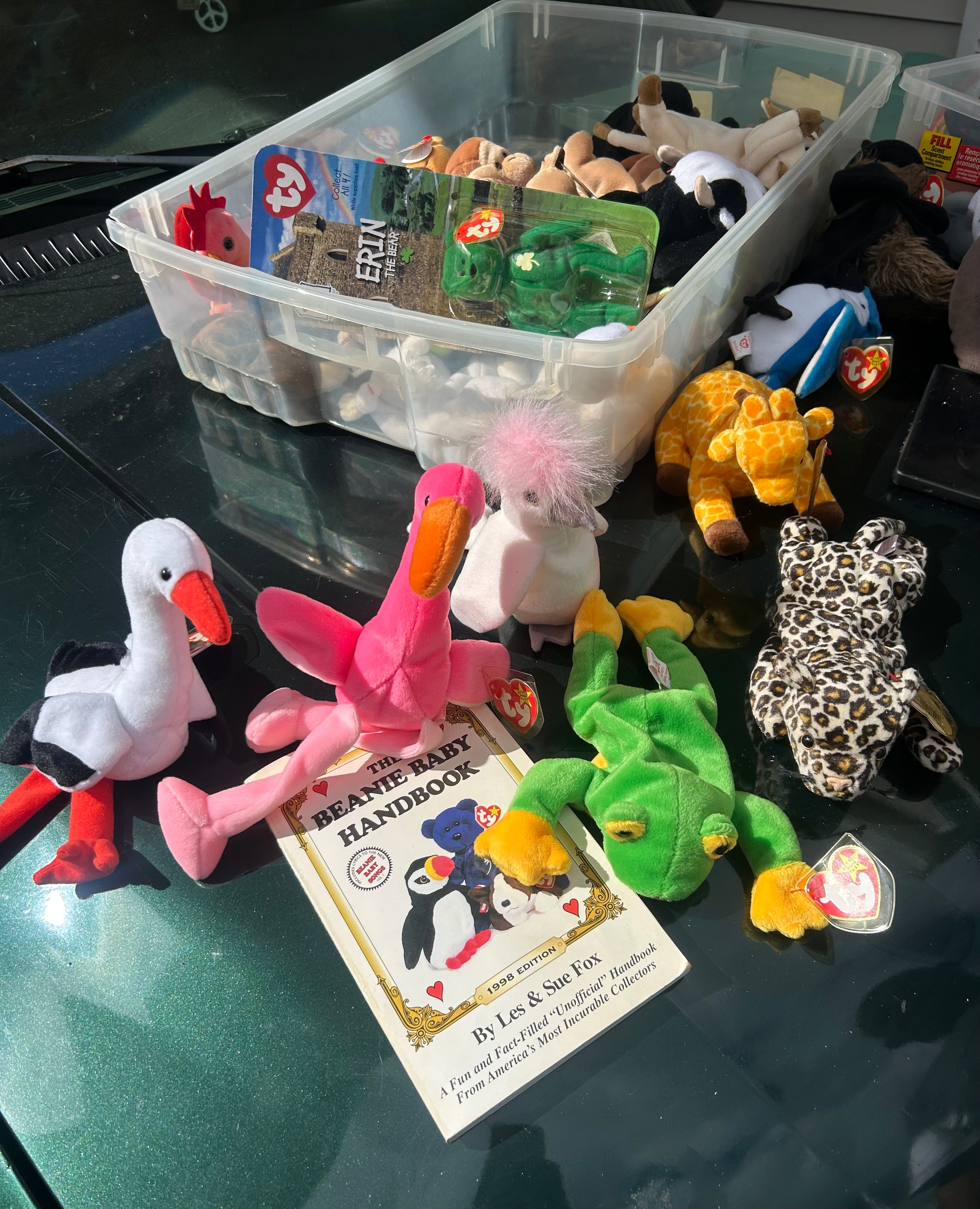 a variety of classic 1990s Beanie Babies, including a tie-dye rabbit (Hippity, Hoppity, or Floppity), Rover the red dog, Strut the rooster, a pink flamingo (Pinky), and a penguin (Rover/Squealer era style. 3 for 25$