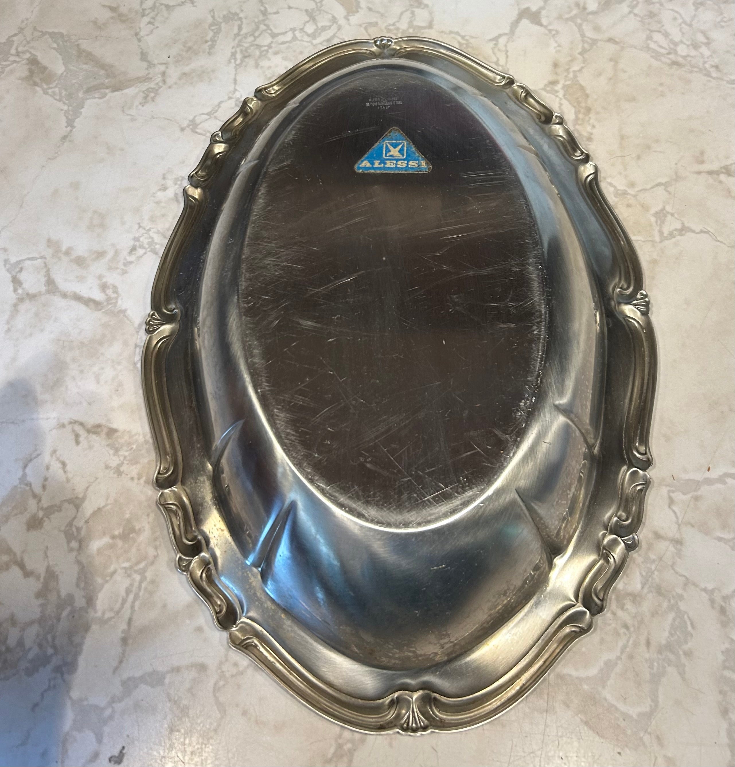 This is a vintage used Alfra Alessi Barocco Italian stainless steel serving bowl.