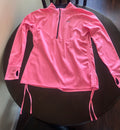 This vibrant pink Avia workout top features a practical quarter-zip closure and adjustable side drawstrings.