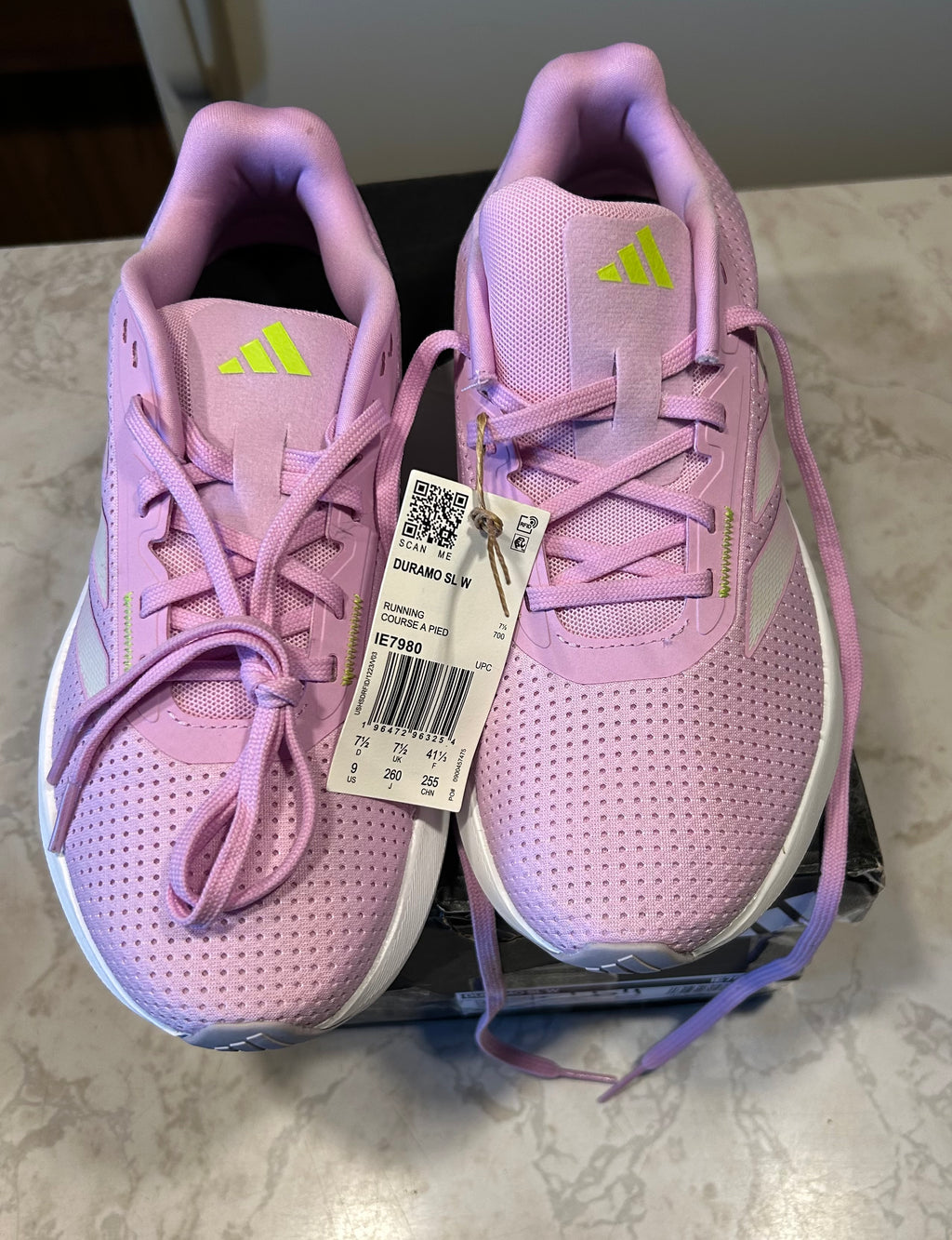 These are Adidas Duramo SL women's running shoes in the Bliss Lilac colorway size U.S 9