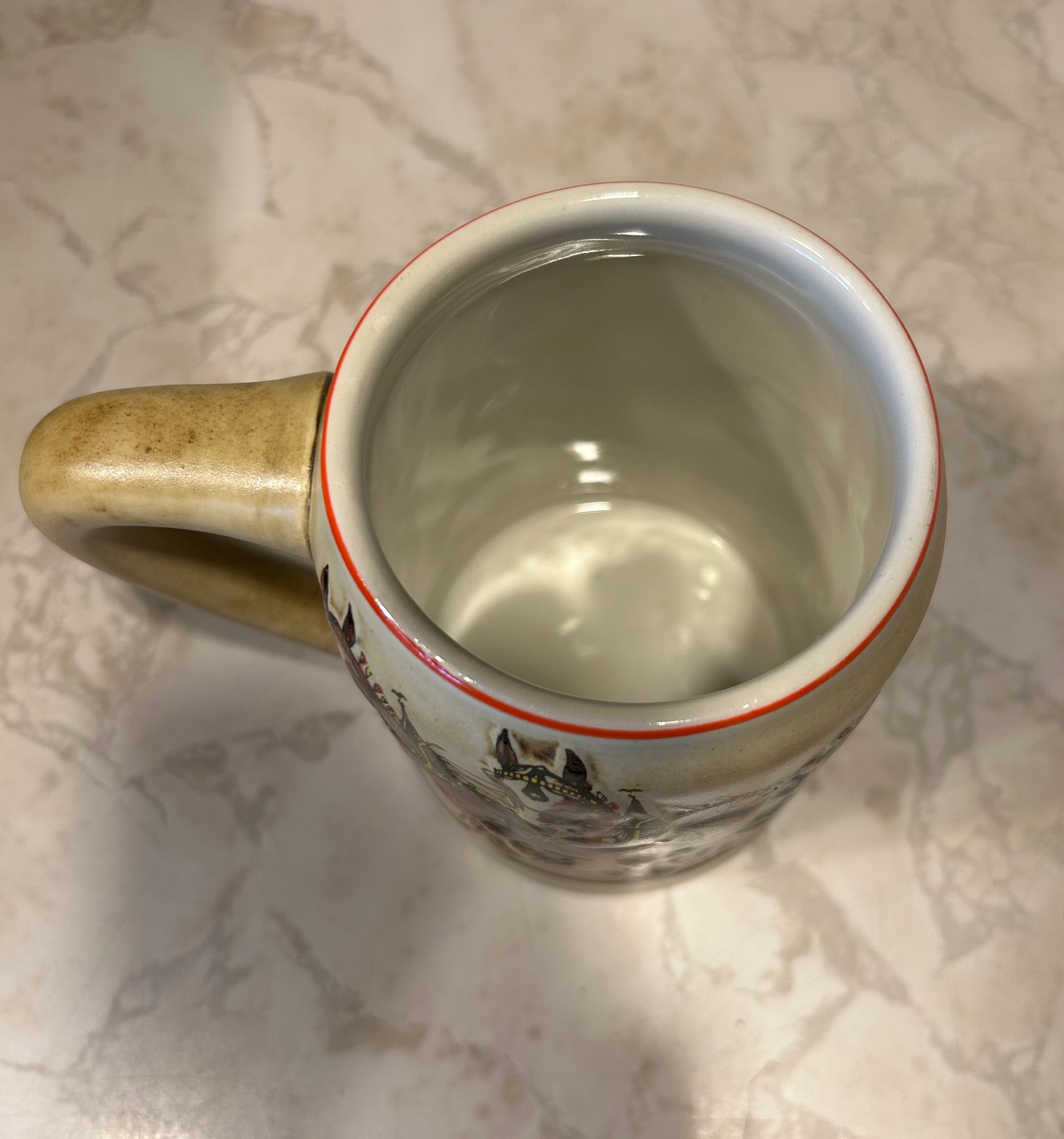 This is a 1980 Budweiser Champion Clydesdales Holiday ceramic mug produced by Ceramarte of Brazil.