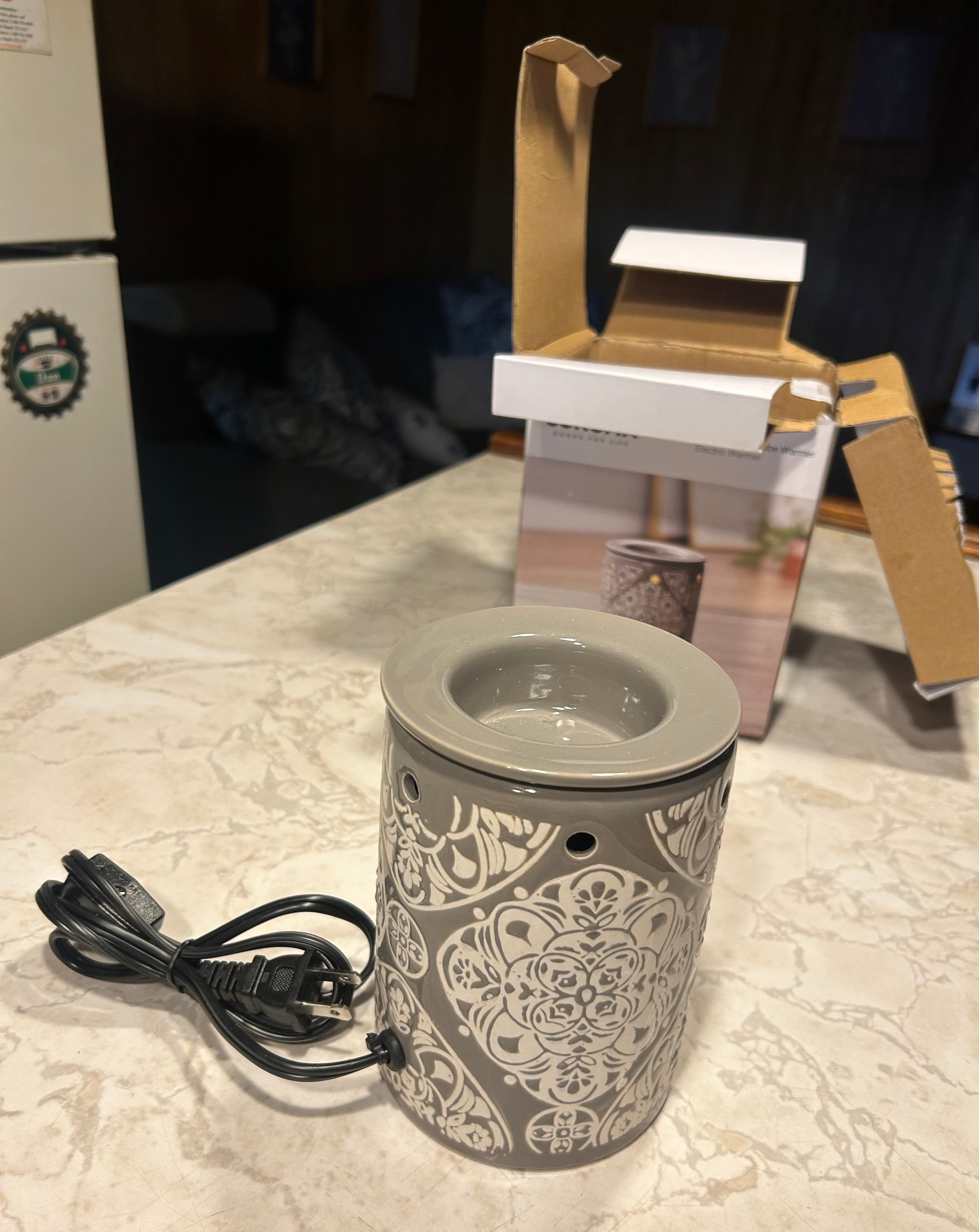 This is a Sonoma Goods For Life medallion electric wax melt warmer.