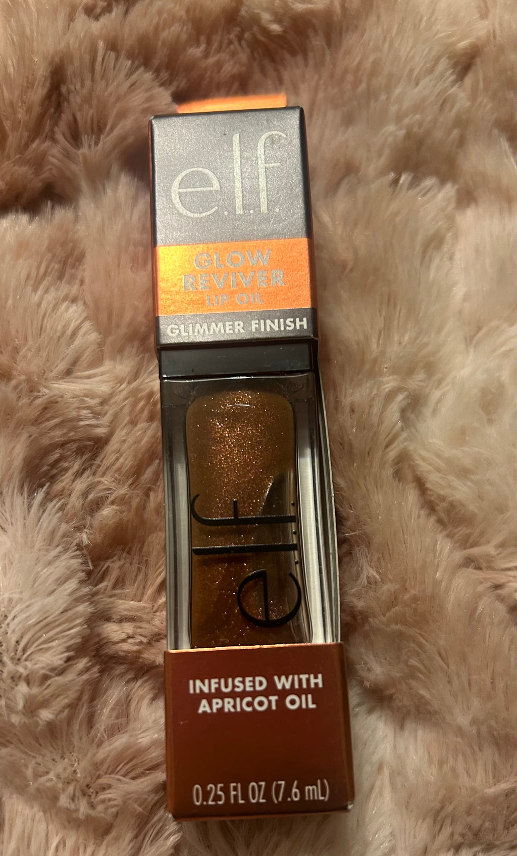 This is an e.l.f. Glow Reviver Lip Oil in a glimmer finish.