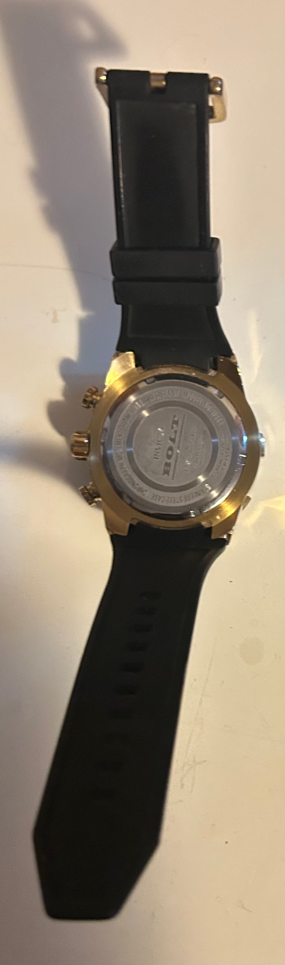 This timepiece is an Invicta Bolt series chronograph wrist watch, specifically matching the aesthetic profile of oversized models like the Invicta Bolt 25526. It features a distinctive, aggressive sport luxury design that emphasizes high visual impact