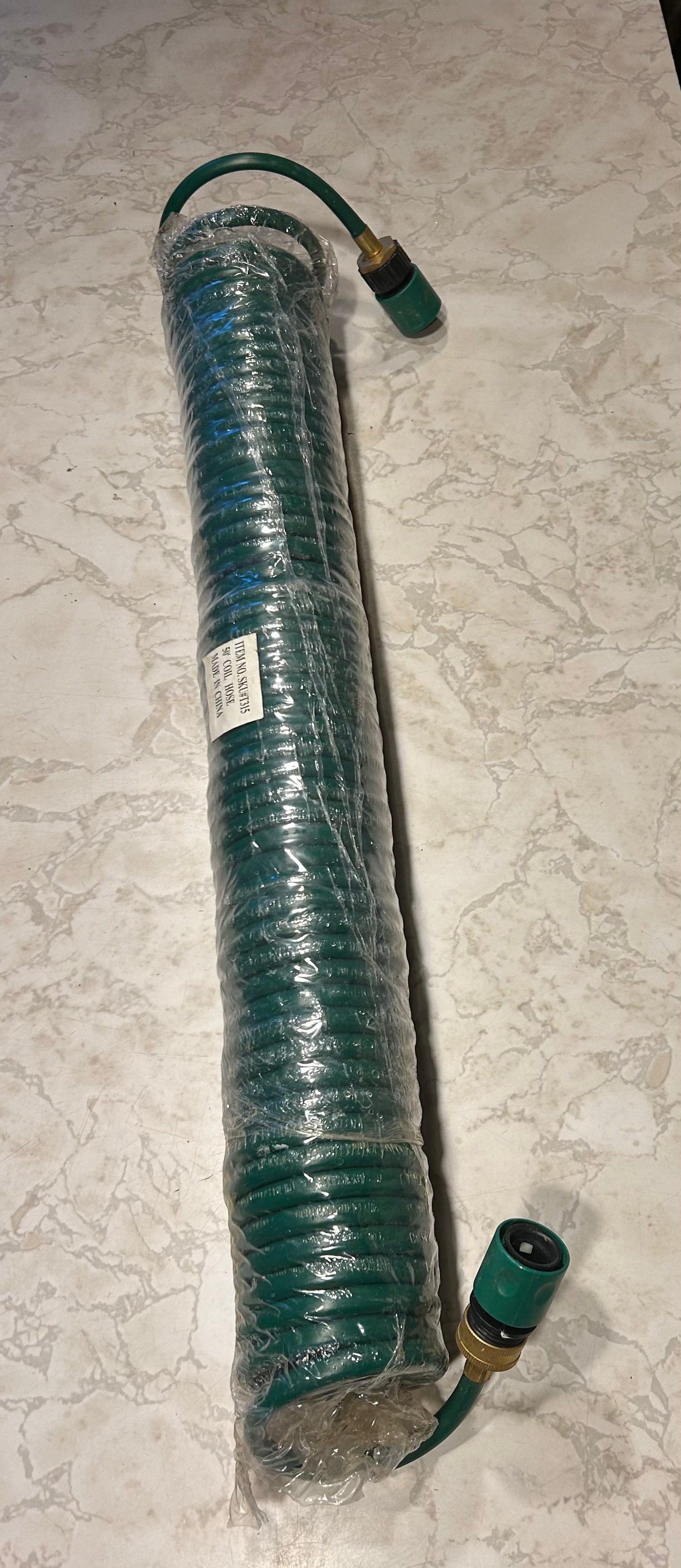 This is a 50-foot green coil garden hose