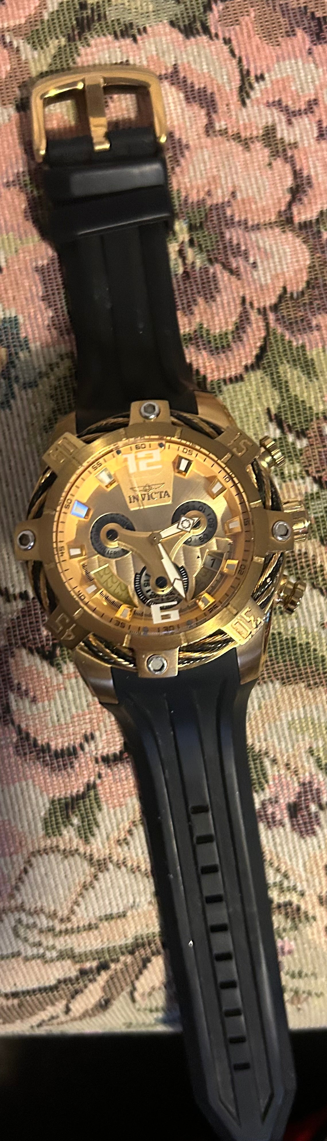 This timepiece is an Invicta Bolt series chronograph wrist watch, specifically matching the aesthetic profile of oversized models like the Invicta Bolt 25526. It features a distinctive, aggressive sport luxury design that emphasizes high visual impact
