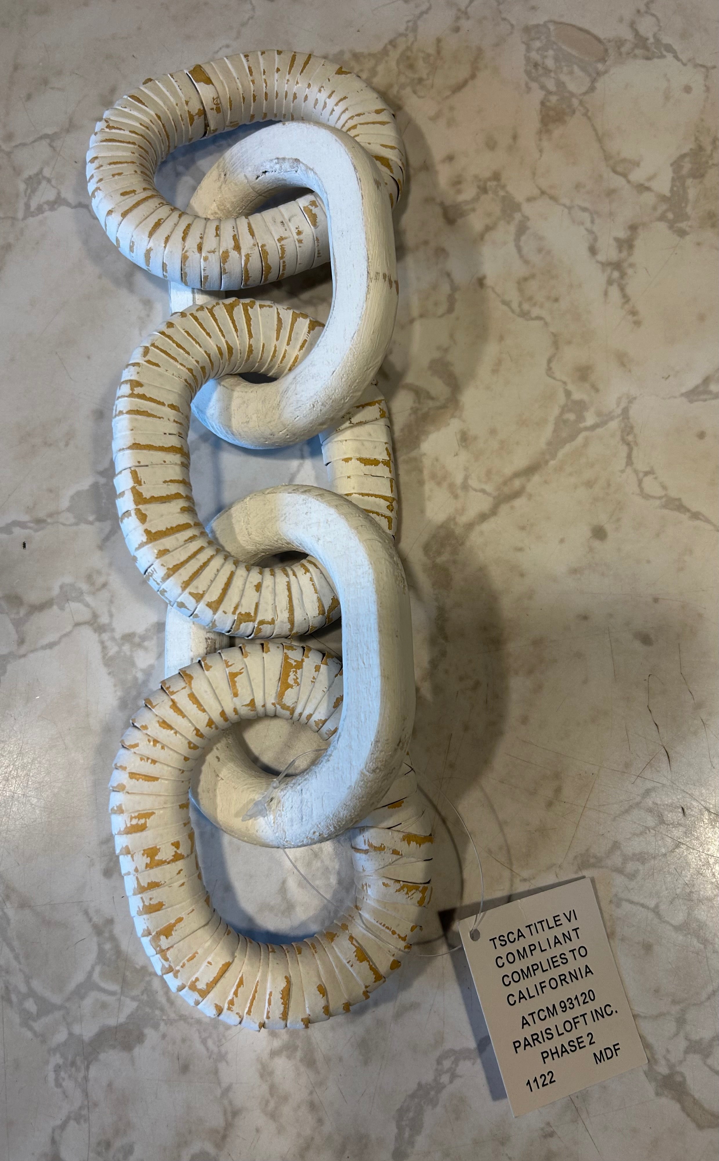 This Paris Loft decorative wood chain features a distressed white and gold finish