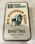 a Duke Cannon Supply Co. Big Bourbon Soap in a collectible tin.