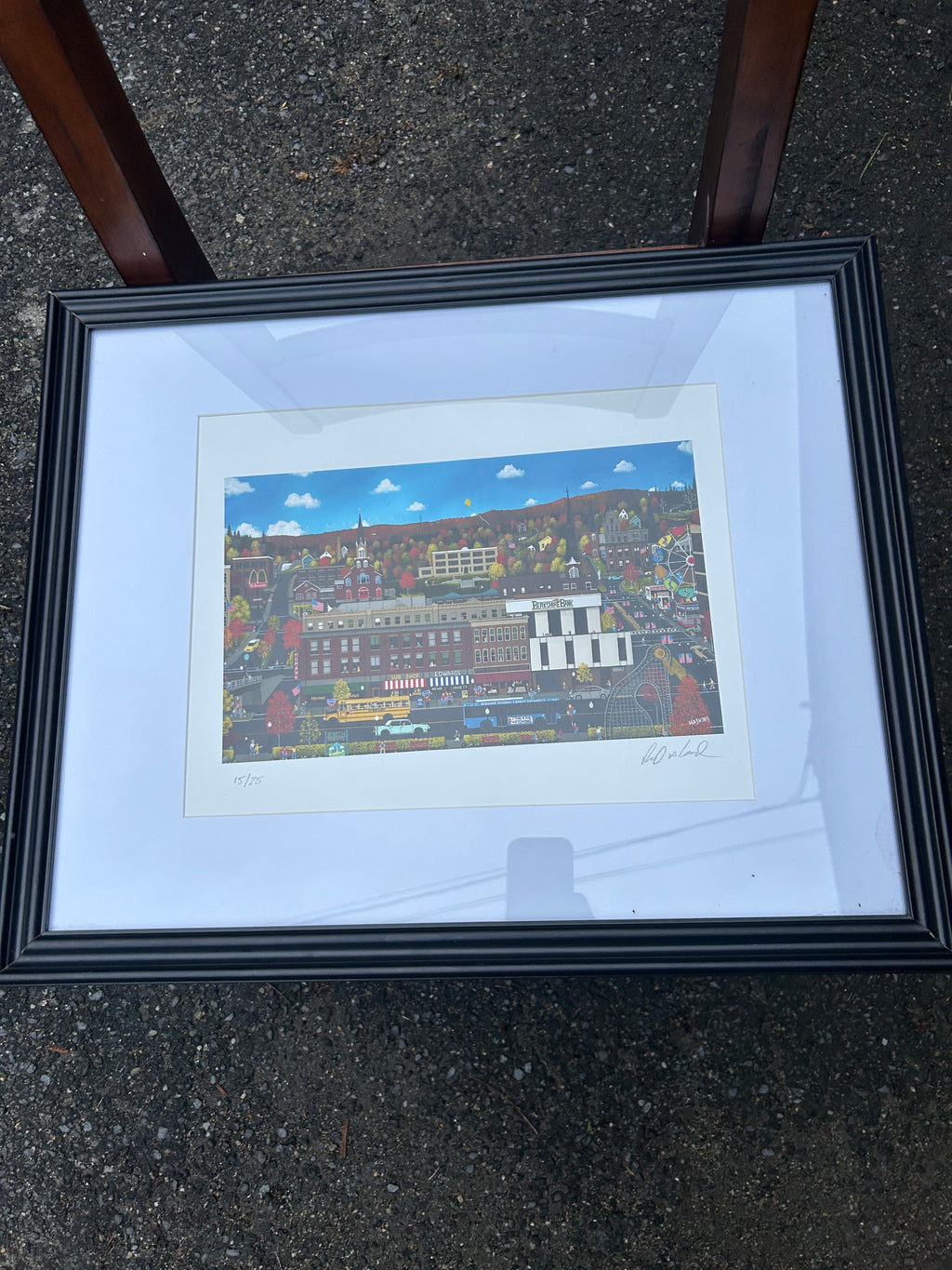 Original signed 15 of 25 “Home is Where The Heart Is" by artist Richard Haskins, featuring a whimsical New England town scene with colorful autumn foliage. “Downtown North Adams