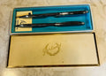 This is a vintage Garland USA pen and pencil gift set in a presentation box.