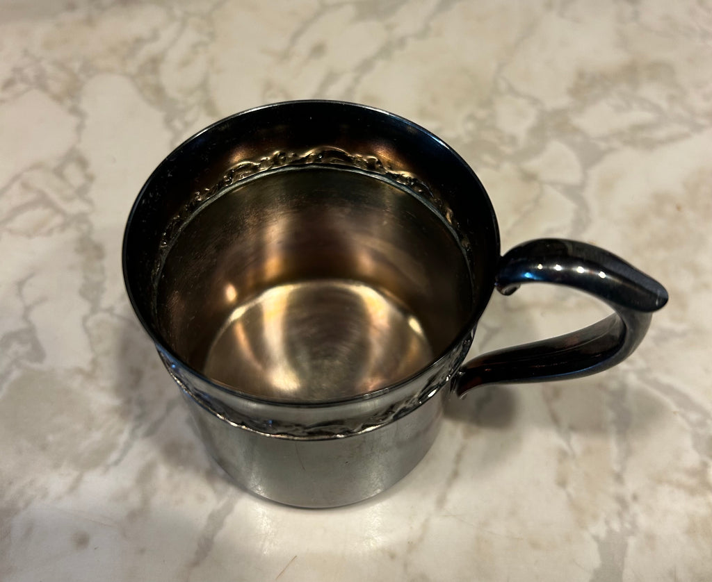 This is a vintage Reed & Barton silver-plated child's cup, model 767.
