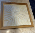 This framed 3D textured beige flower wall art features minimalist floral design suitable for living room decor.