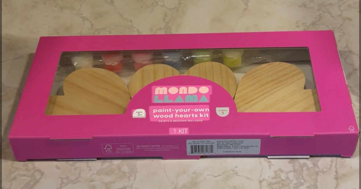 This is a Mondo Llama Paint-Your-Own Wood Hearts Kit featuring three wooden hearts, paint pots, and brushes.