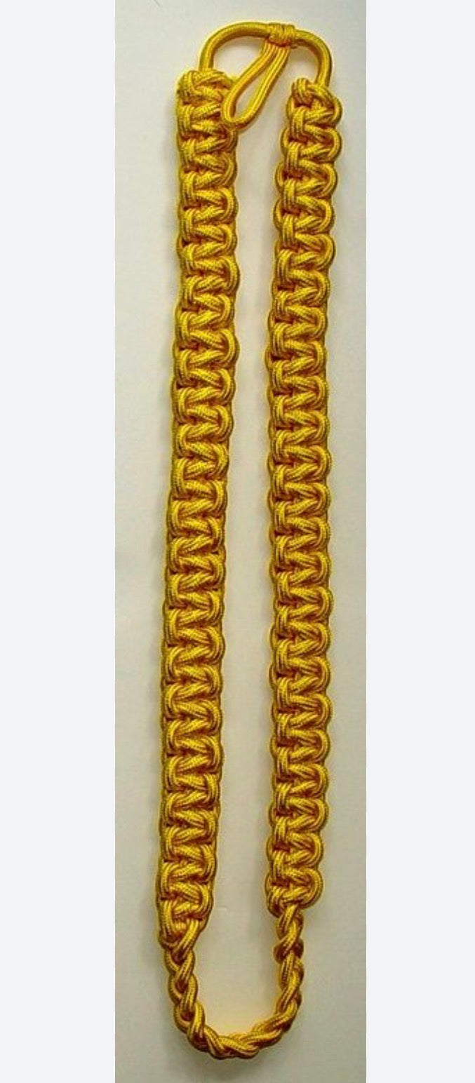 This is a gold nylon cobra knot aiguillette military parade shoulder cord.