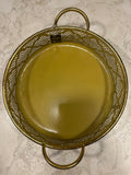 This Alyassen Collection golden decorative tray features a pierced metal filigree design and a handle.