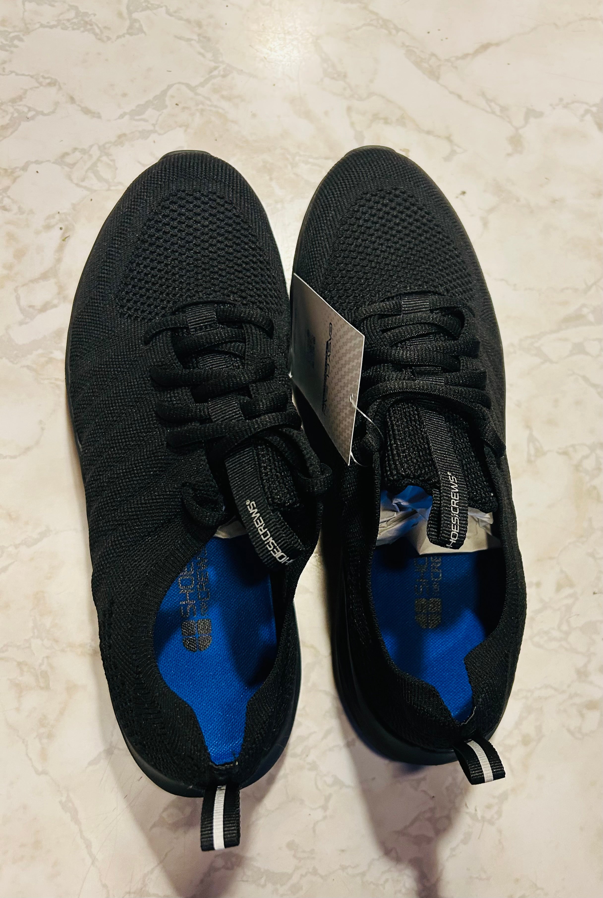 These are size 9 black Shoes For Crews Everlight athletic-style work sneakers with Easy Clean technology.