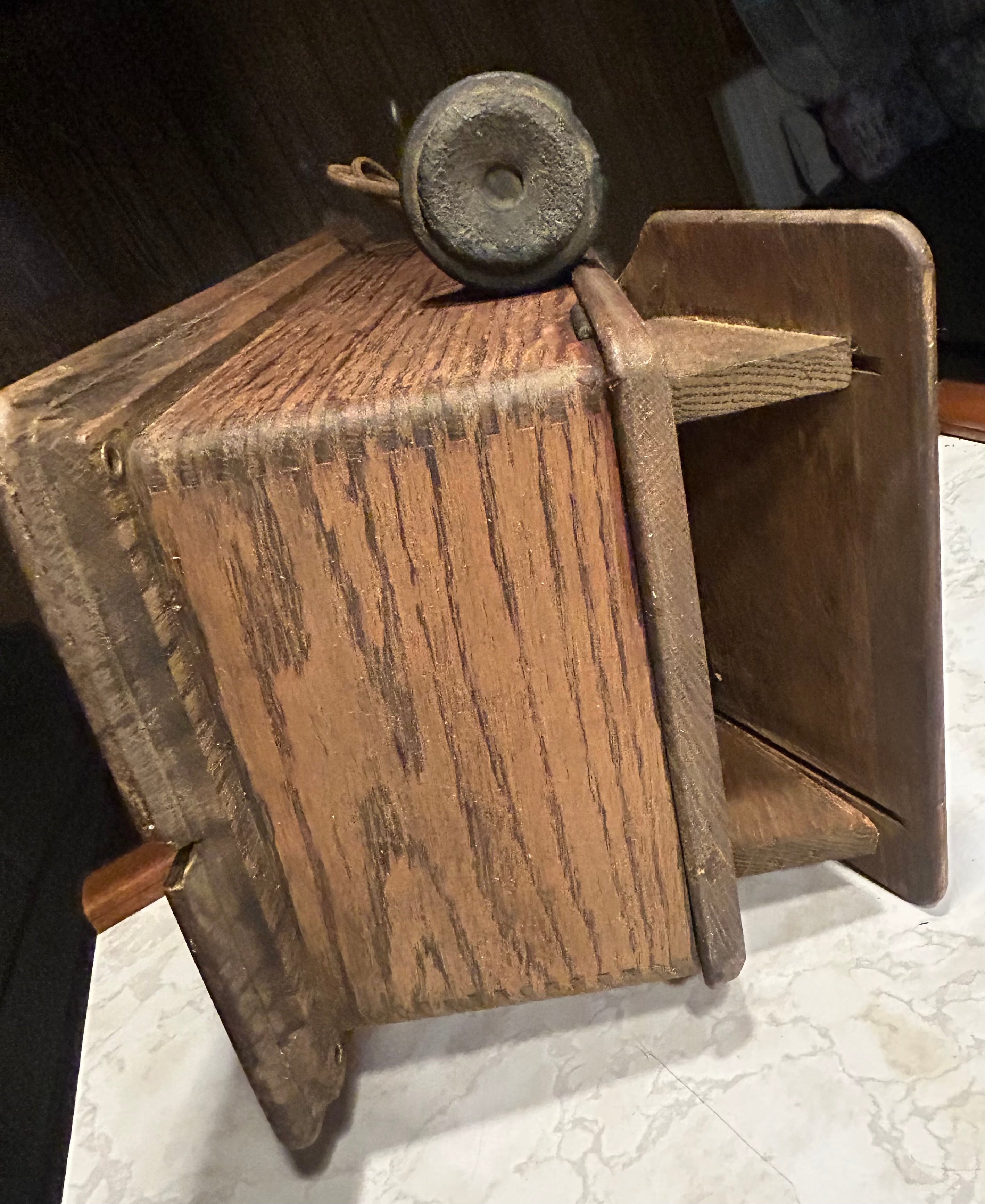 This is an antique wooden wall-mounted crank telephone, likely manufactured by companies such as Kellogg or Western Electric in the early 1900s.